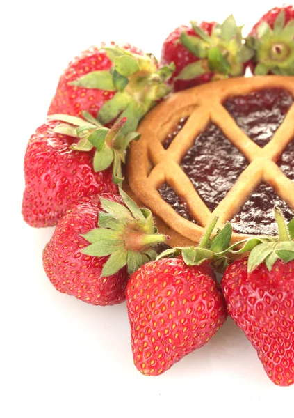 Tart garnished with strawberry on white background close-up — Stock Photo, Image
