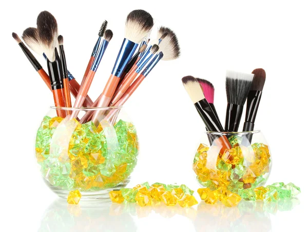 Make-up brushes in two bowls with stones isolated on white — Stock Photo, Image