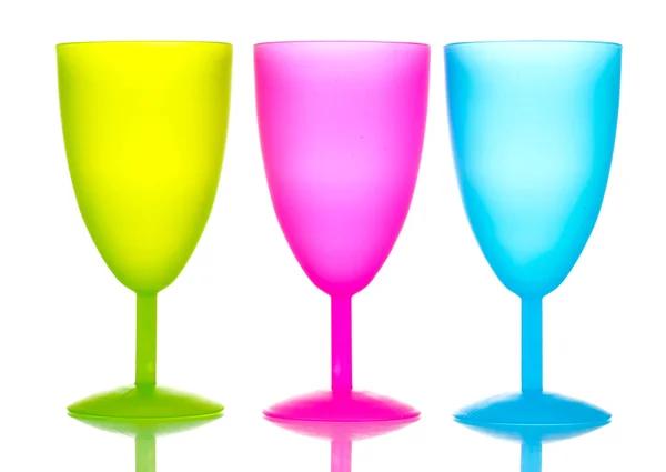 Luminosas copas de plástico aisladas en blanco —  Fotos de Stock