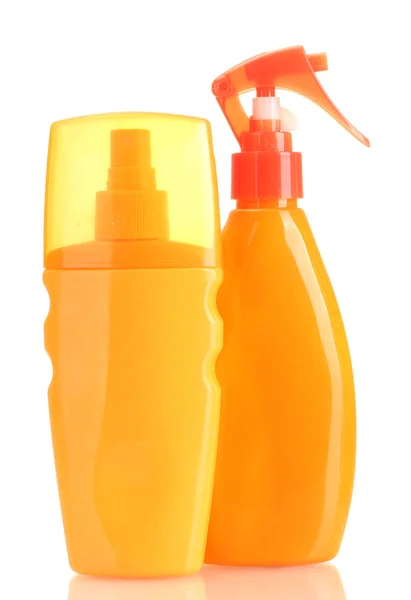 Botellas con crema bronceadora aislada en blanco —  Fotos de Stock
