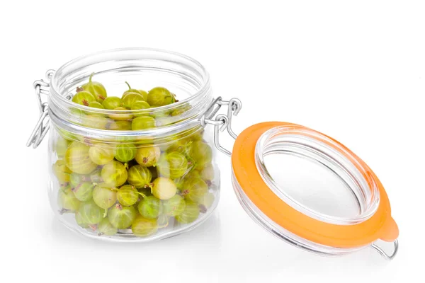 Green gooseberry in jar isolated on white — Stock Photo, Image