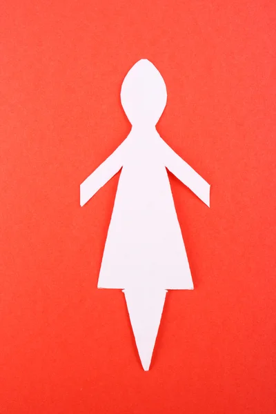 Mulher de papel no fundo vermelho — Fotografia de Stock