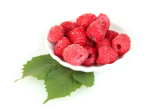 Fresh raspberries in white saucer isolated on white — Stock Photo, Image