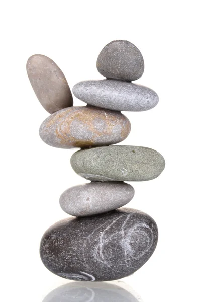 Stack of balanced stones isolated on white Royalty Free Stock Images