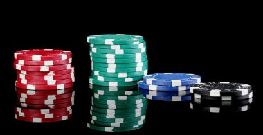 Casino chips isolated on black clipart