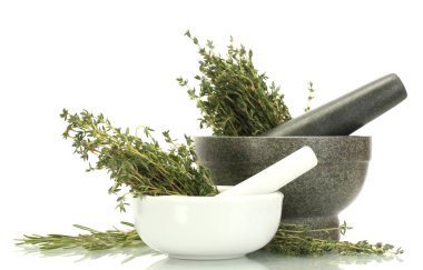 Mortars with fresh green thyme and rosemary isolated on white clipart