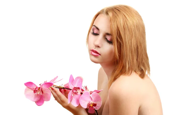 Retrato de jovem mulher sexy com flor de orquídea rosa — Fotografia de Stock