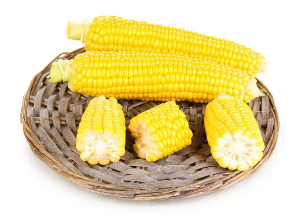 Fresh corn on wicker mat isolated on white — Stock Photo, Image