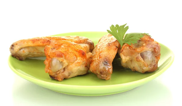 Roasted chicken wings with parsley in the plate isolated on white — Stock Photo, Image