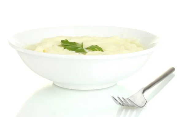 Картопляне пюре з петрушкою в тарілці ізольовані на білому — стокове фото