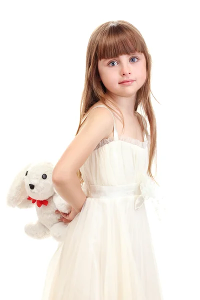 Porträtt av vacker söt flicka med leksak kanin isolerad på vit — Stockfoto