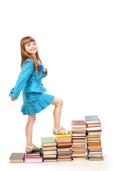 Petite fille avec un livre isolé sur blanc — Photo
