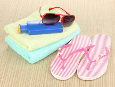 Beach accessories on mat