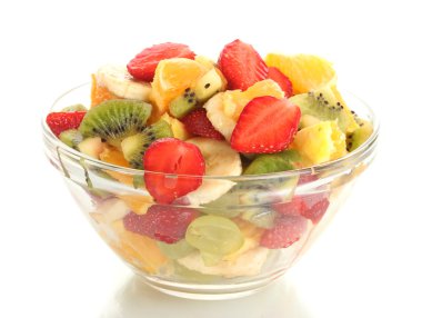 Glass bowl with fresh fruits salad isolated on white clipart