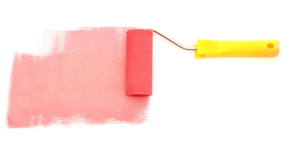 Rolo de pintura com tinta vermelha isolada em branco — Fotografia de Stock