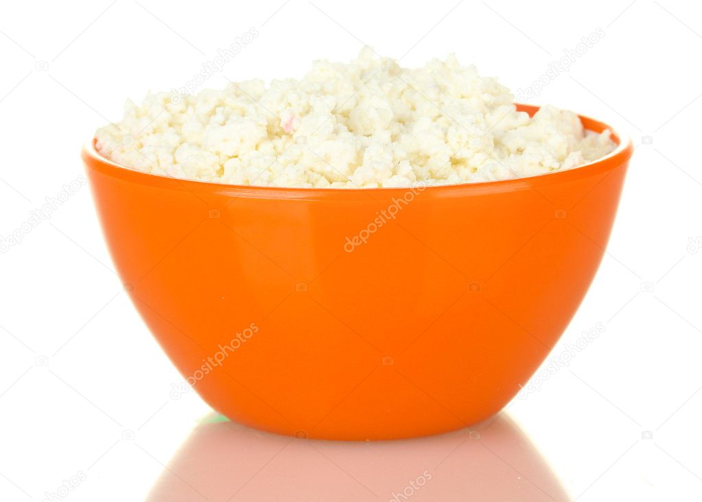 Cottage cheese in orange bowl isolated on white