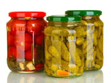 Jars of canned vegetables isolated on white clipart