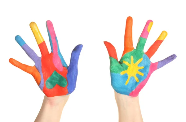 Brightly colored hands on white background close-up — Stock Photo, Image