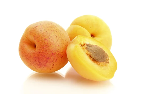 Ripe sweet apricots isolated on white — Stock Photo, Image