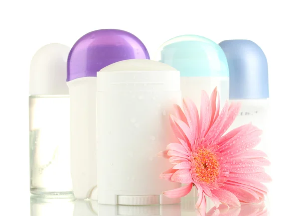 Desodorantes con flor aislada en blanco —  Fotos de Stock