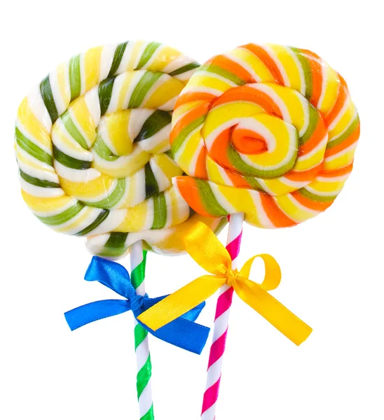Colorful lollipops with ribbons isolated on white — Stockfoto
