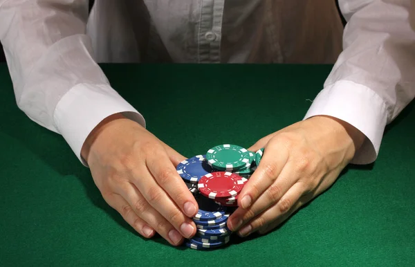 Taking win in poker on green table — Stock Photo, Image