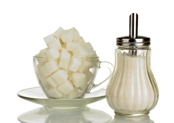 Stock image Refined sugar in glass cup with sugar bowl isolated on white background