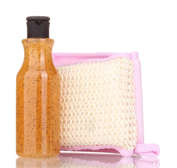 Bottle with scrub and sponge isolated on white — Stock Photo, Image