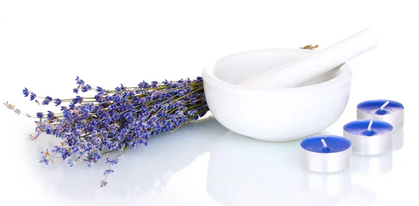 Lavendel met mortel en kaarsen geïsoleerd op wit — Stockfoto