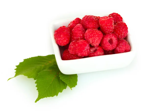 Fresh raspberries in white bowl isolated on white — Stock Photo, Image