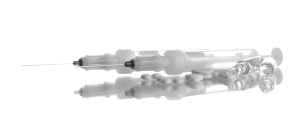 Syringes monovet and pills isolated on white — Stock Photo, Image
