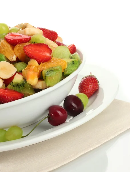 Bowl with fresh fruits salad and berries isolated on white — Stock Photo, Image