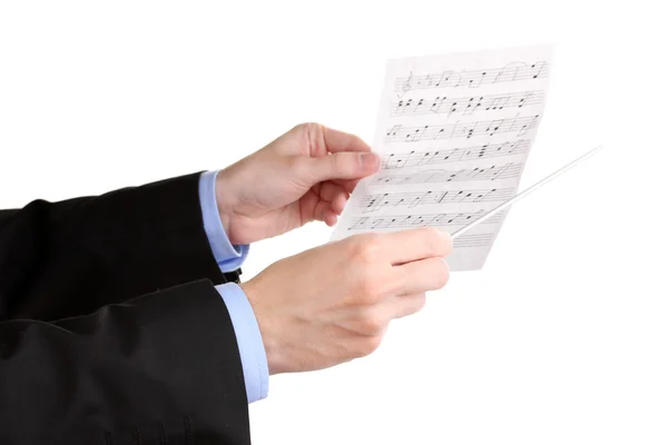 Mãos de maestro de música com bastão e notas isoladas em branco — Fotografia de Stock