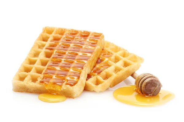 Belçika waffle üzerine beyaz izole bal ile — Stok fotoğraf