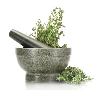 Mortar with fresh green thyme isolated on white clipart