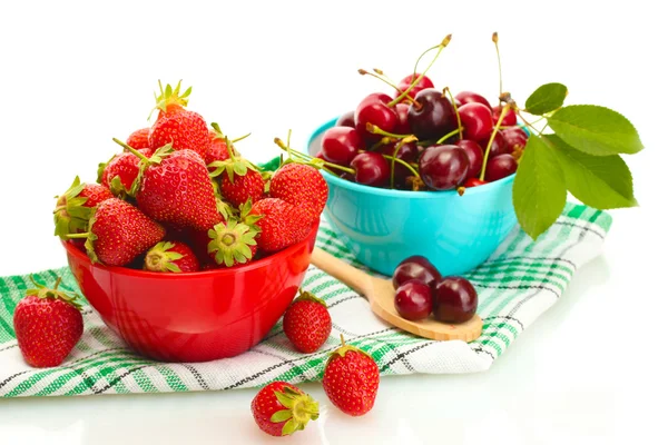 Ripe strawberries and cherry berries in bowls isolated on white — Stock Photo, Image