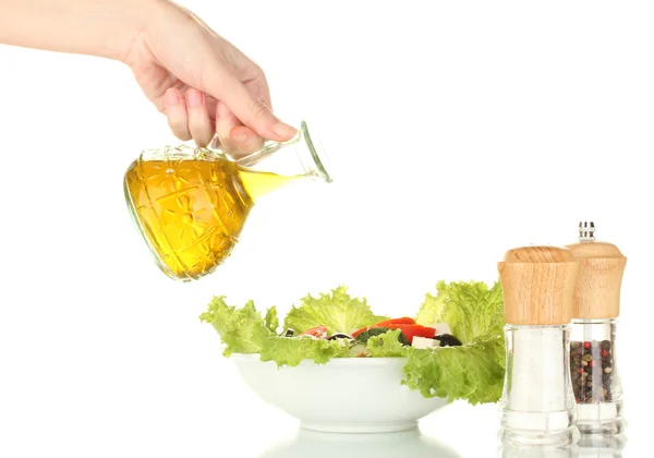 Salada grega temperada com azeite sobre fundo branco — Fotografia de Stock