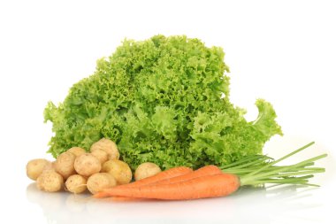 Young potatoes, carrots and lettuce isolated on white clipart