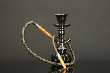 Hookah isolated on black background clipart