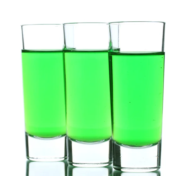 Três copos de absinto isolado em branco — Fotografia de Stock