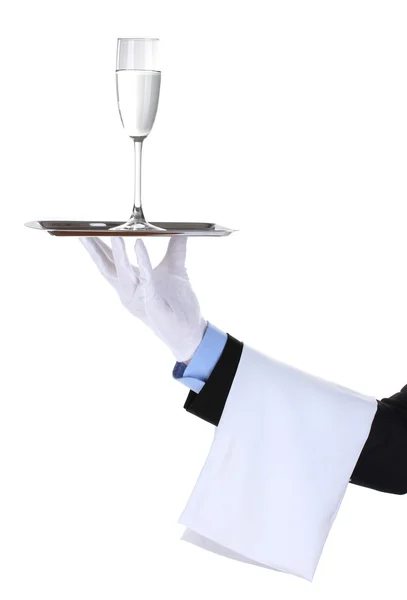 Formal waiter with a glass of water on silver tray isolated on white — Stock Photo, Image