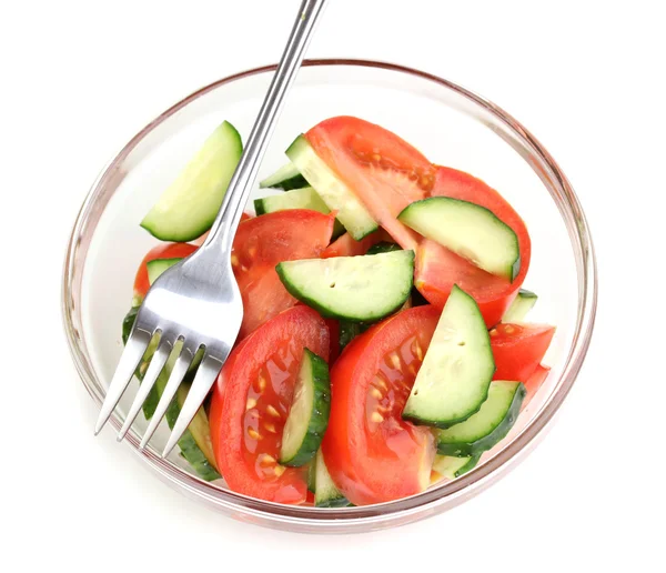 Fresh salad with tomatoes and cucumbers isolated on white — Stockfoto