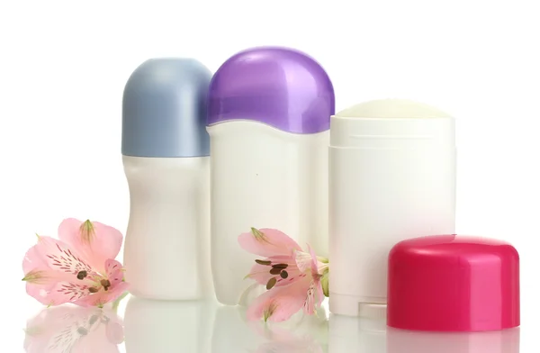 Deodorants with flowers isolated on white — Stock Photo, Image