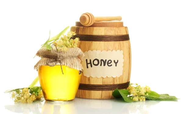 Jar and barrel with linden honey and flowers isolated on white — Stock Photo, Image