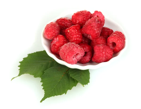 Fresh raspberries in white saucer isolated on white — Stock Photo, Image