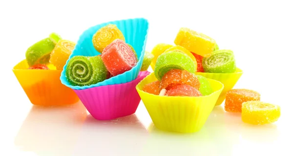 Sweet jelly candies in cup cake cases isolated on white — Stock Photo, Image