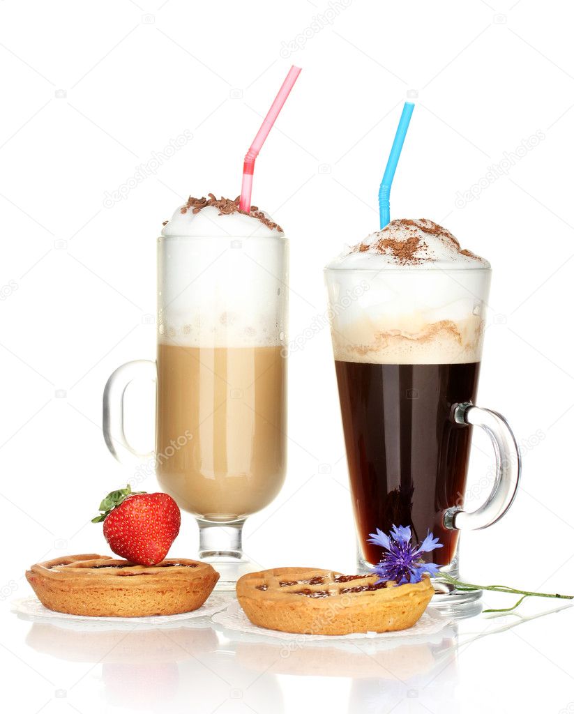 Glasses of coffee cocktail with tarts on doily, strawberry and flower isolated on white