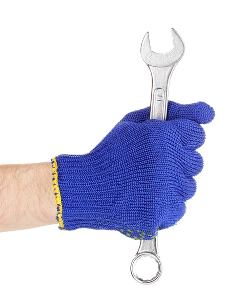 Ключ в руке с защитной перчаткой изолирован на белом — стоковое фото