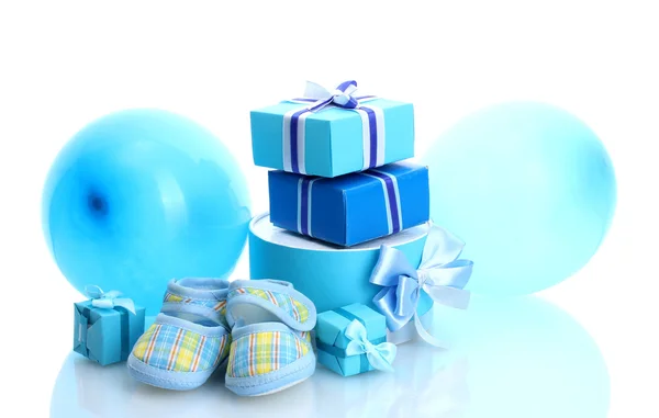Beautiful gifts, baby's bootees and balloons isolated on white — Stock Photo, Image