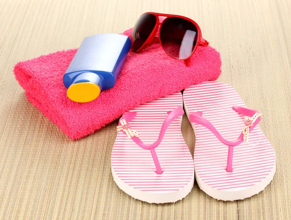 Beach accessories on mat — Stock Photo, Image